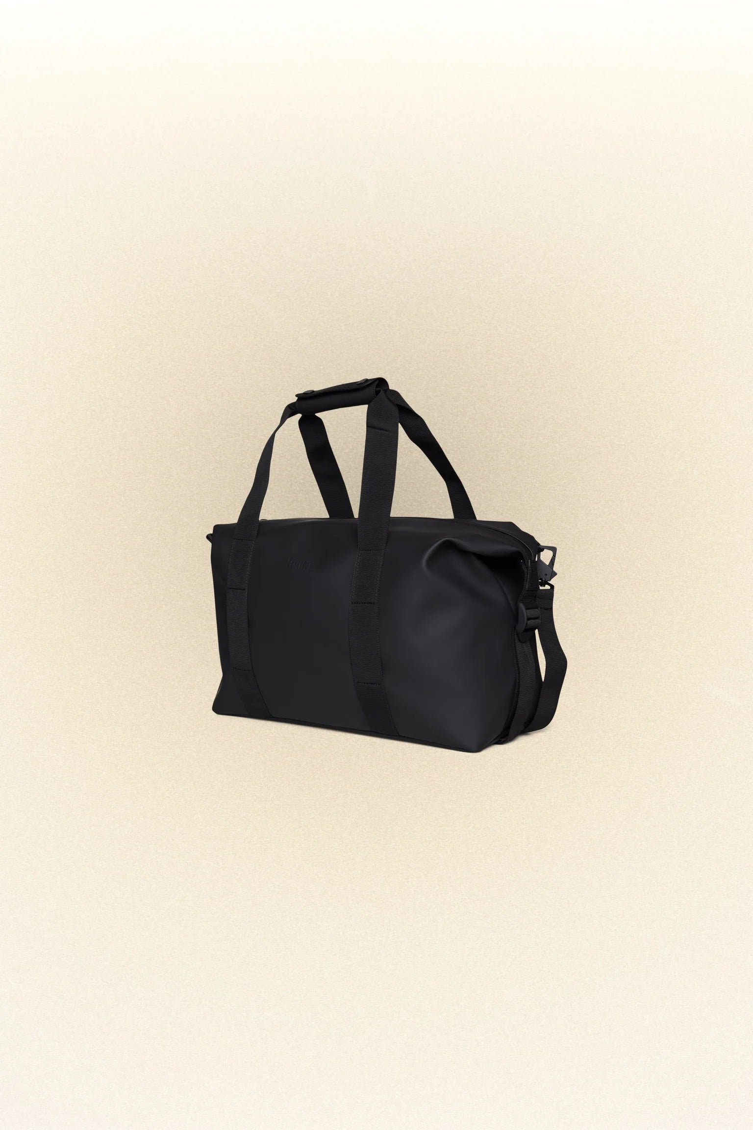 A Hilo Weekend Bag Small - Black by Rains on a white background.