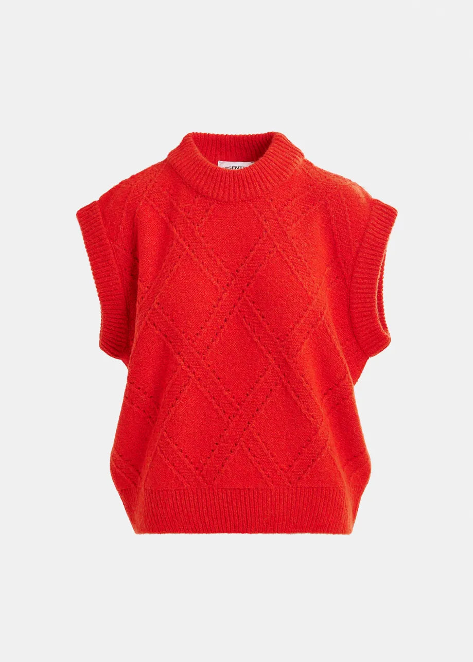 Essentiel Antwerp's Import Cable-Knit Sweater in red features a wool-blend, sleeveless design with a textured diamond pattern and ribbed crew neck, armholes, and hem, shown against a plain white background.