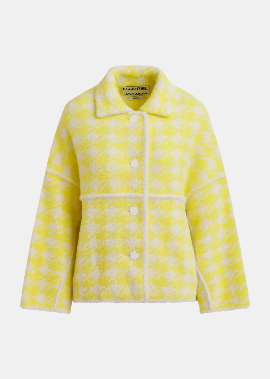 The Joking Houndstooth Knit Cardigan by Essentiel Antwerp is yellow and white with a houndstooth pattern, large white buttons, and a collar, shown on a plain background.