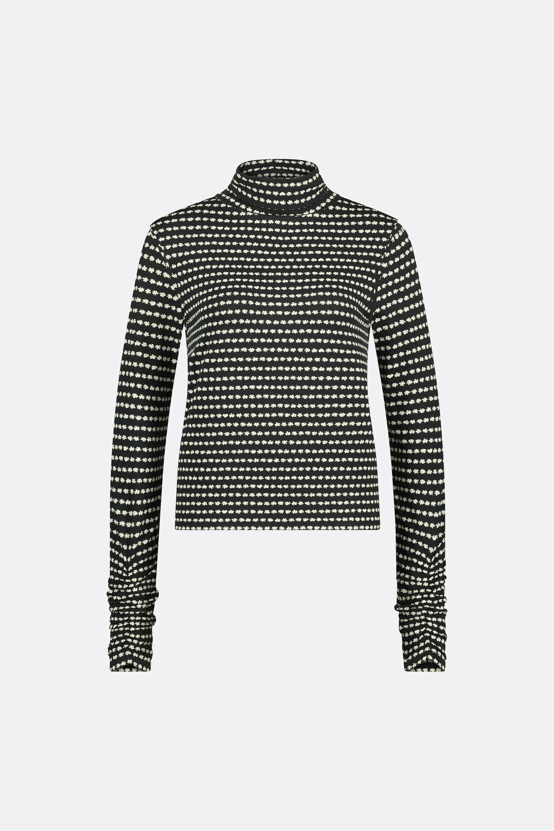 Black and white slim fit Jade Top by Fabienne Chapot, featuring a striking pattern and long sleeves, displayed on a plain white background.