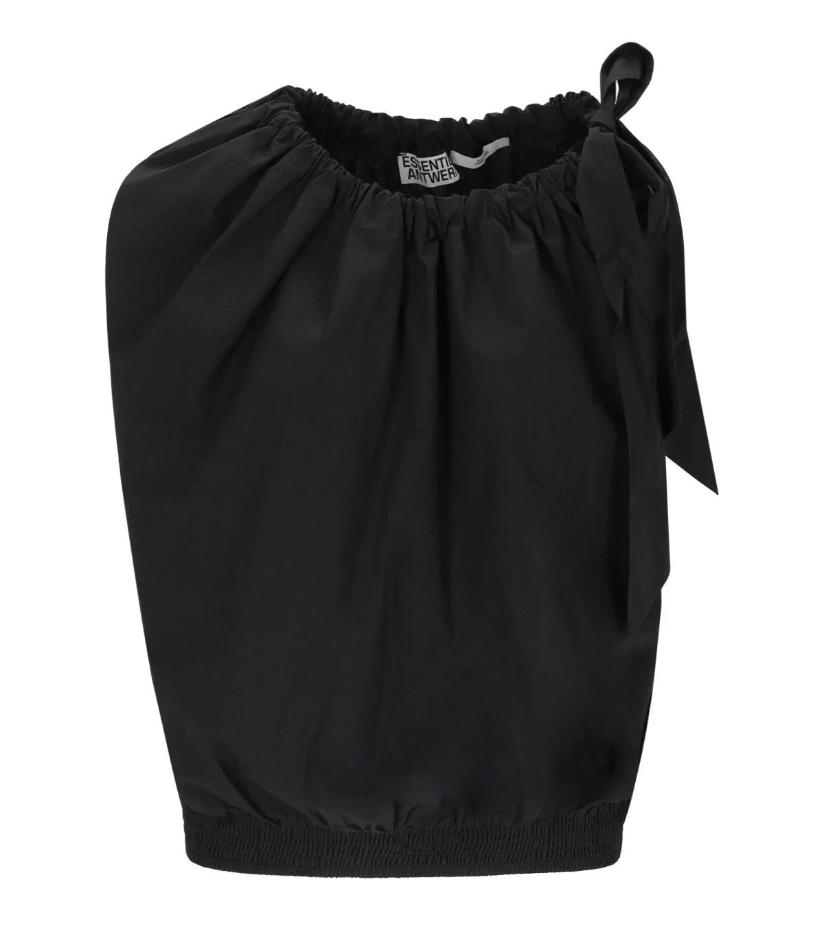 The Jaylah Asymmetric Top by Essentiel Antwerp is a black cotton off-the-shoulder top with an asymmetric neckline, gathered details, smocked hem, and a side bow accent.