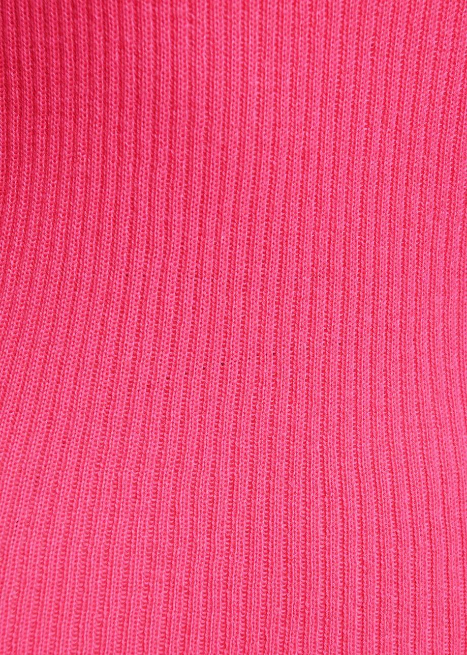 Close-up of the bright pink ribbed knit fabric from the Kelmuse Knitted Pullover by Essentiel Antwerp, featuring a vertical pattern that’s perfect for a cozy and stylish look.