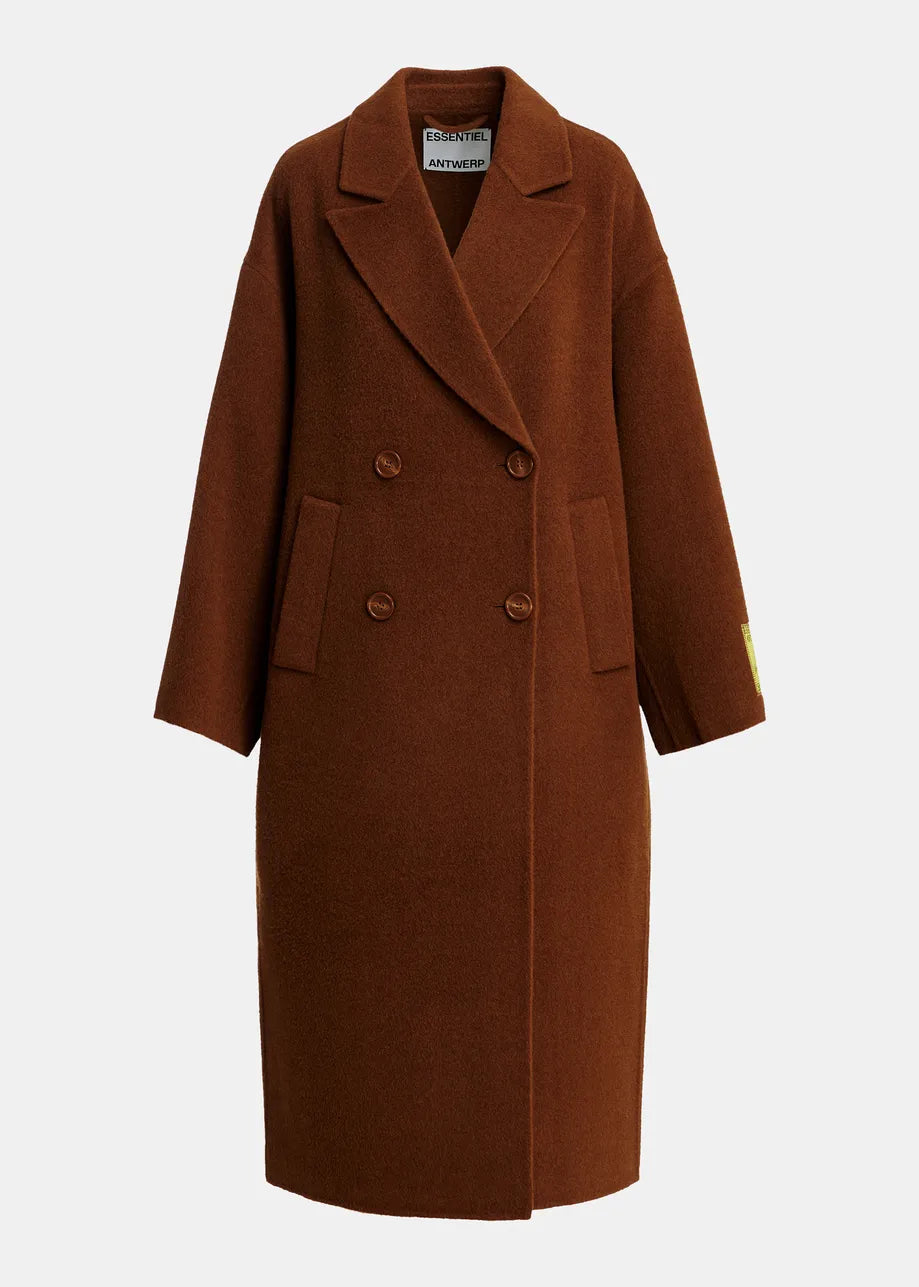 The Kelp Oversized Wool-Cashmere Blend Coat by Essentiel Antwerp is a long brown double-breasted coat, crafted from a luxurious wool-cashmere blend and featuring wide lapels, front patch pockets, and a label on the left sleeve, displayed against a plain white background.