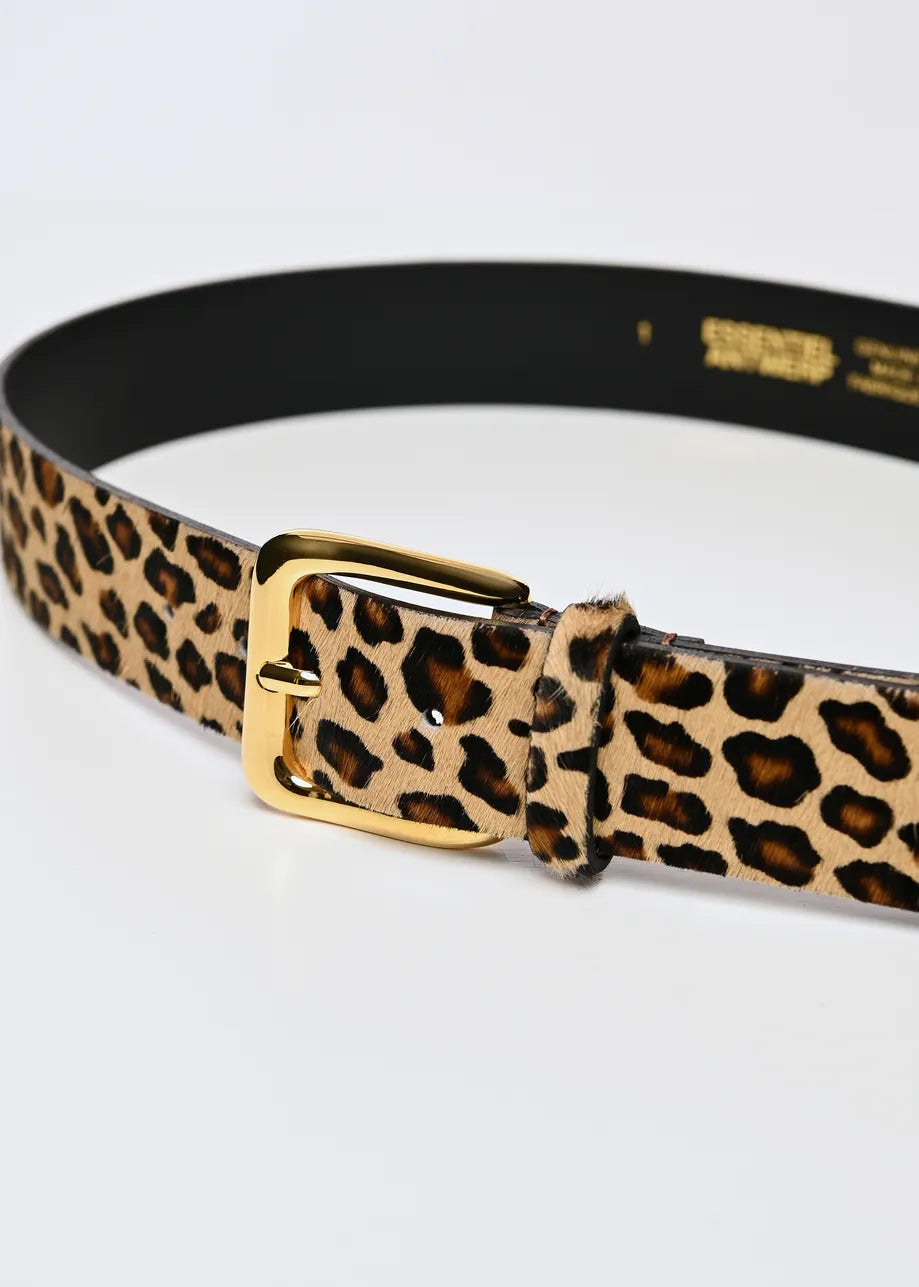 A leopard print belt with a gold buckle, shown coiled on a white background. The belt features a tan base with black and brown leopard spots, and a black inner lining with gold essentiel antwerp branding inside.