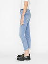 person wears le garcon in galeston by Frame Denim styled with black strappy high sandals, white blouse and a black leather blazer, side view in a white studio backdrop
