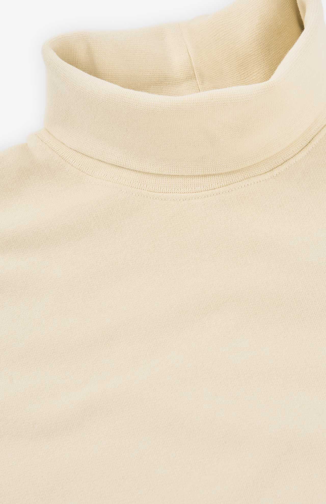 Close-up image of the Lise Sweatshirt - Natural by Loreak Mendian on a white background.