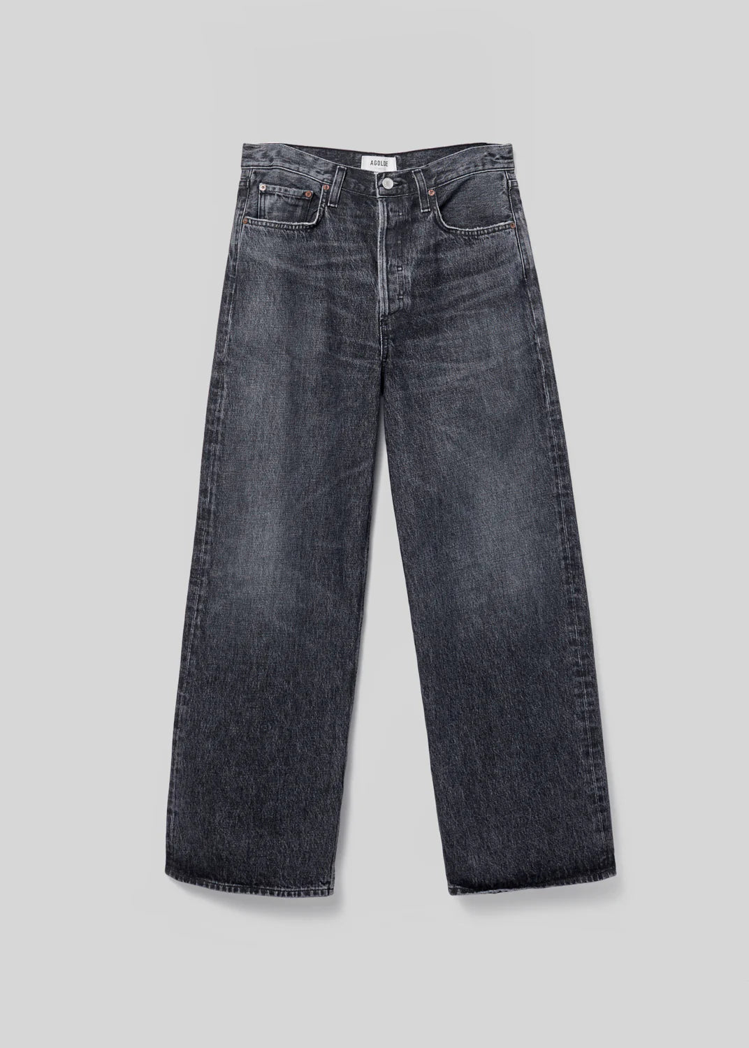 A pair of AGOLDE Low Slung Baggy 30.5" jeans in dark-wash, made from organic cotton, is laid flat against a gray background.