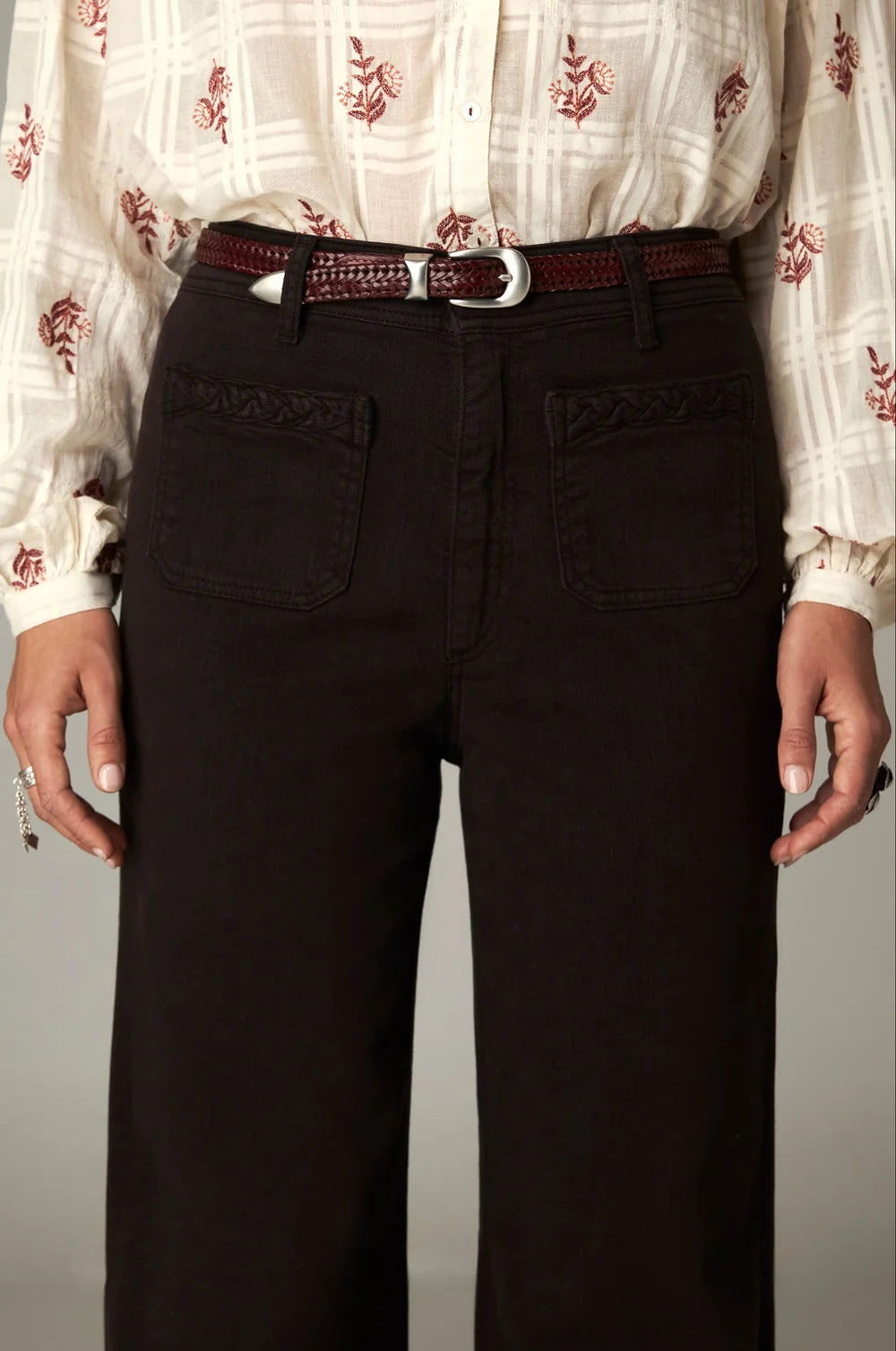 Maison Hotel Giulietta Pant - Coffee: high-waisted, dark brown wide-leg pants with front patch pockets, worn with a braided leather belt.