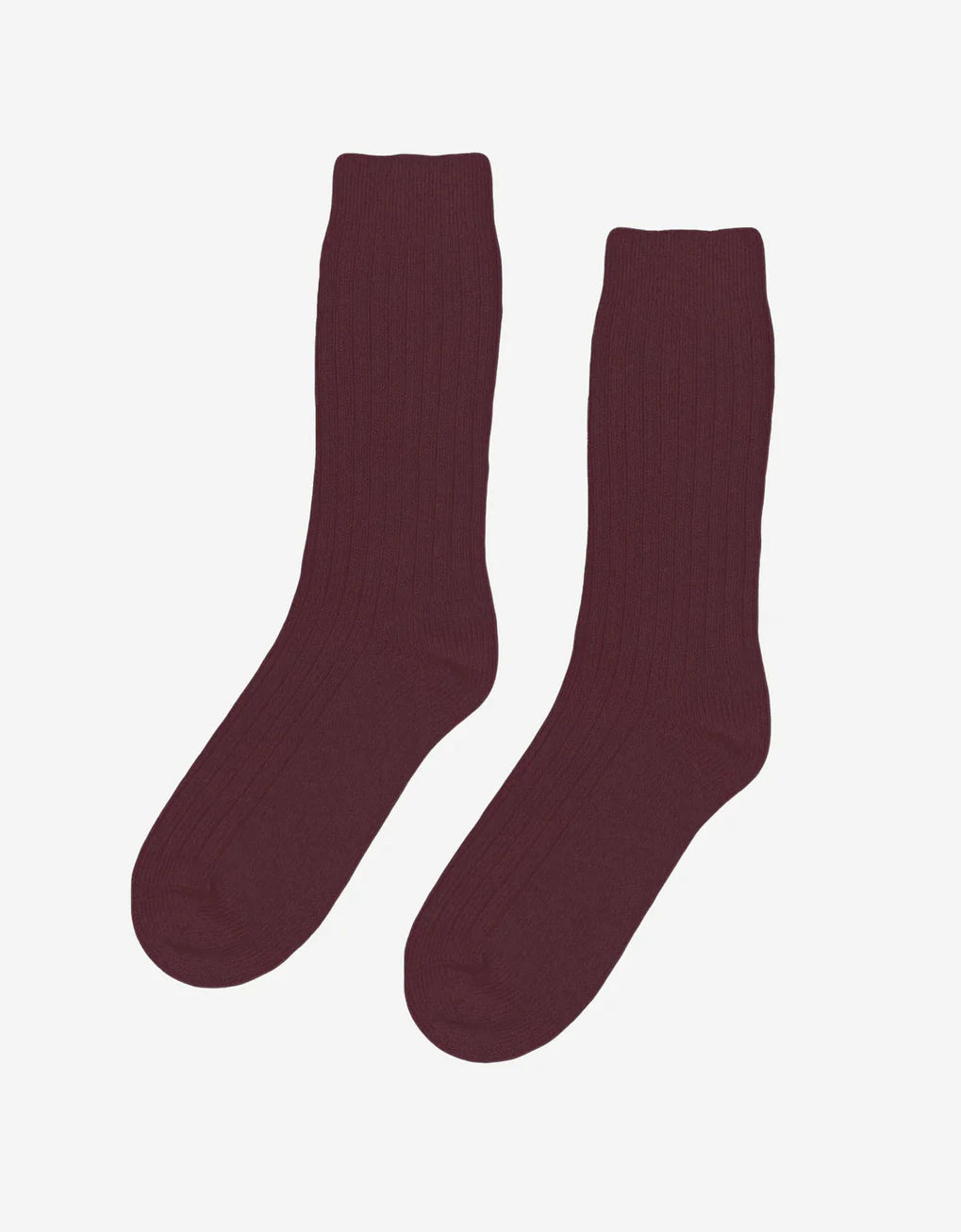 A pair of breathable Merino Wool Blend Socks by Colorful Standard on a white background.