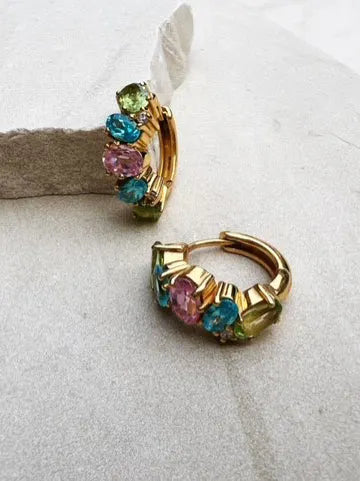 Shyla Shyla - A pair of gold hoop earrings with vibrant colored stones perfect for summer.