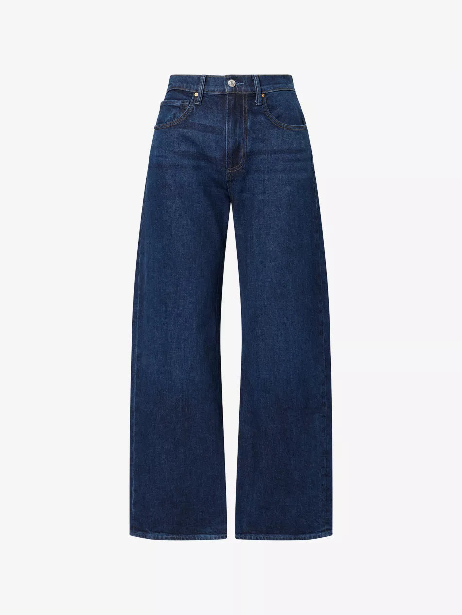 The Arellia Skimmer Barrel Leg – Visage by Paige features a dark vintage-inspired wash, high waist, wide leg, classic five-pocket design, and front button-zip closure, crafted from Paige denim and displayed on a white background.