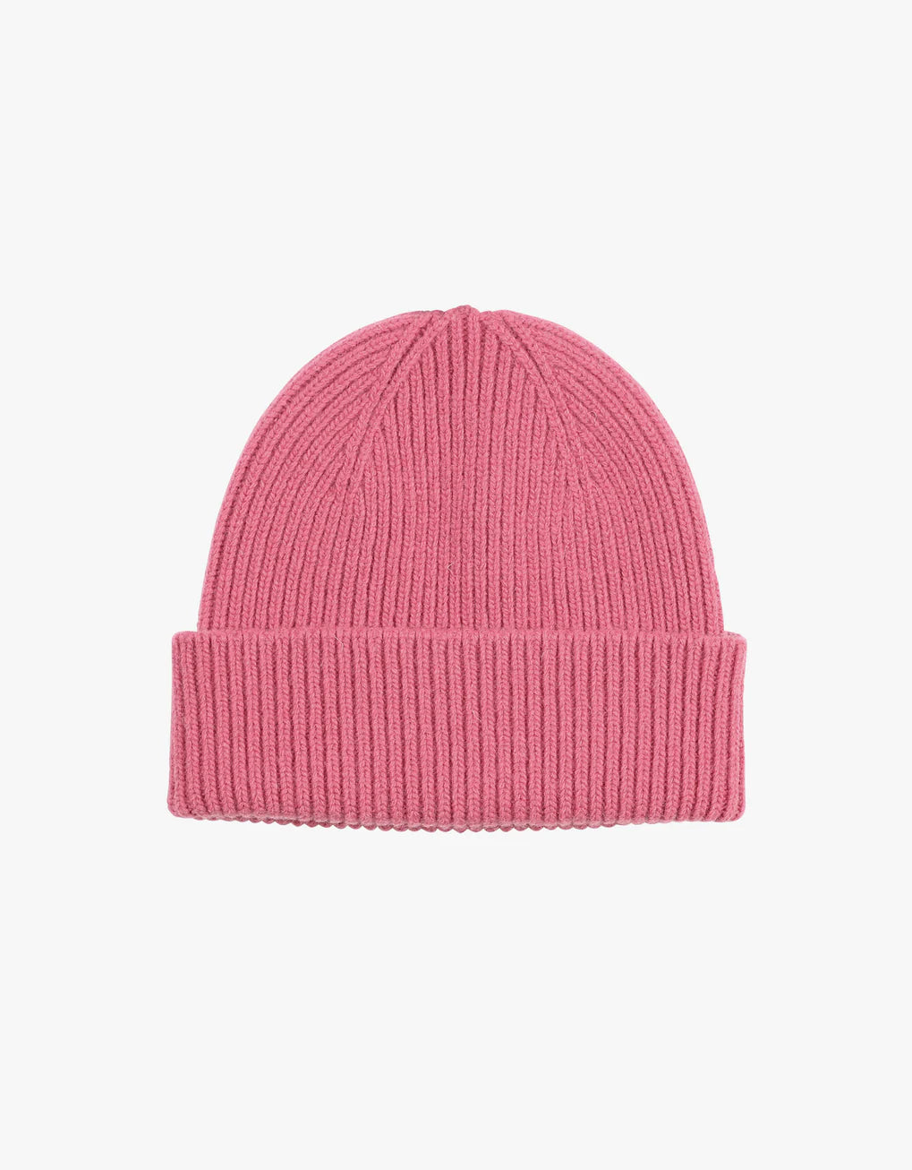 A Colorful Standard Merino Wool Beanie in pink, perfect for the season, placed on a white background.