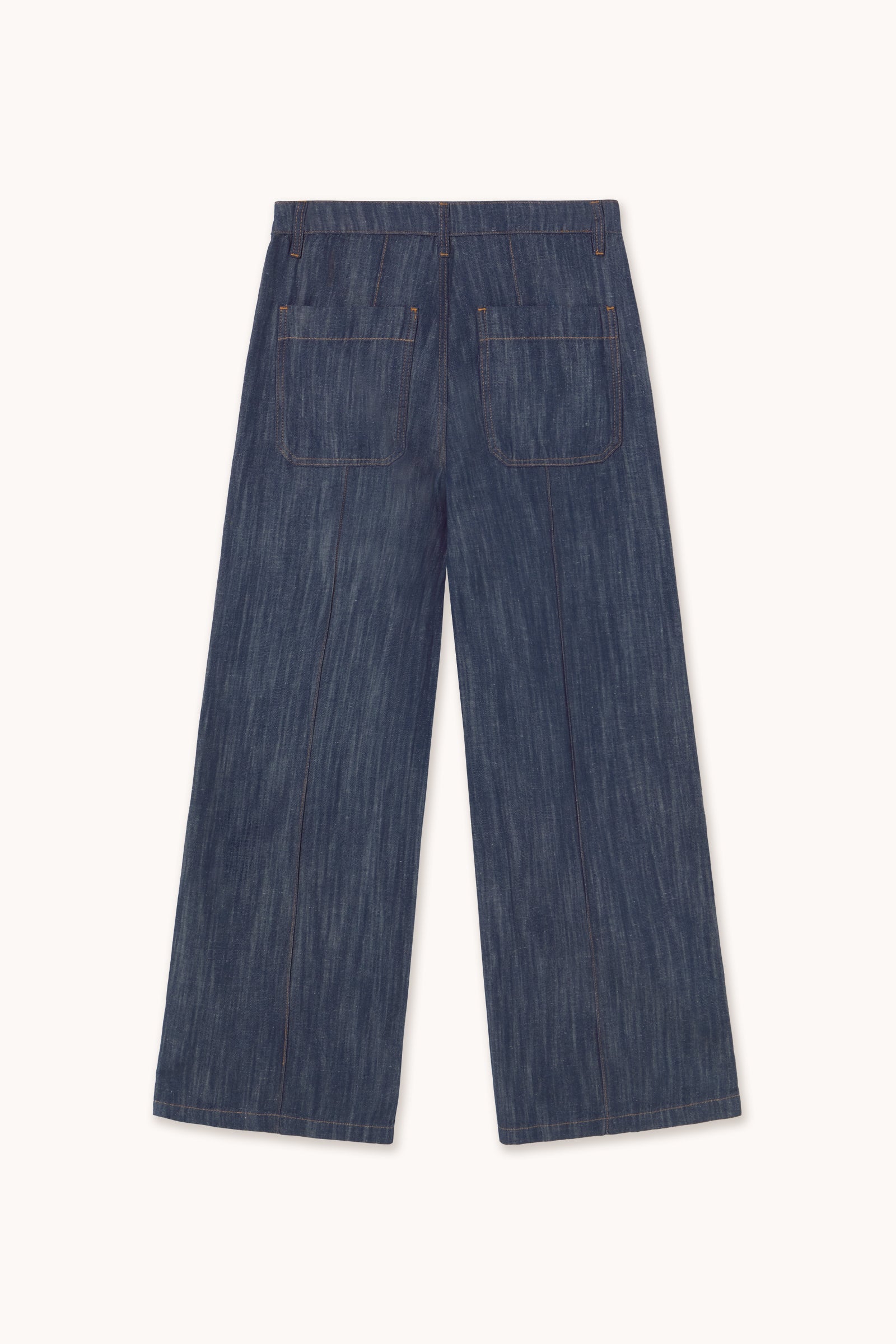 Back view of Tiny Big Sister Wide Leg Linen/Denim Trousers in indigo, featuring a high waist, wide-leg cut, and two large back pockets, shown against a plain light background.