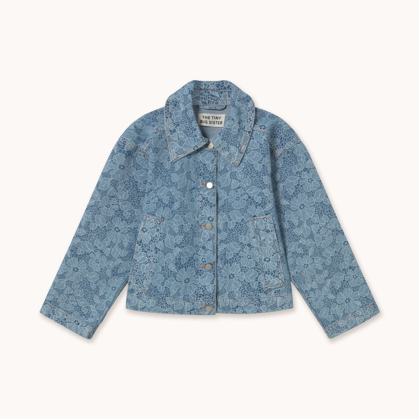 Blue denim jacket on a white background