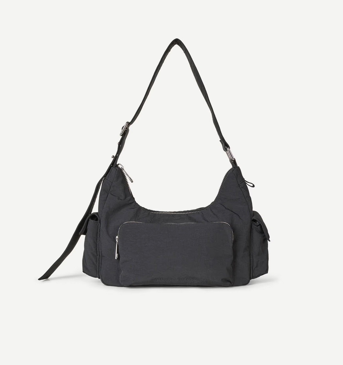 The Samsøe Samsøe Saamelie Bag - Black is a recycled polyamide shoulder bag with an adjustable strap, front zipper pocket, and two side pockets, displayed against a white background.