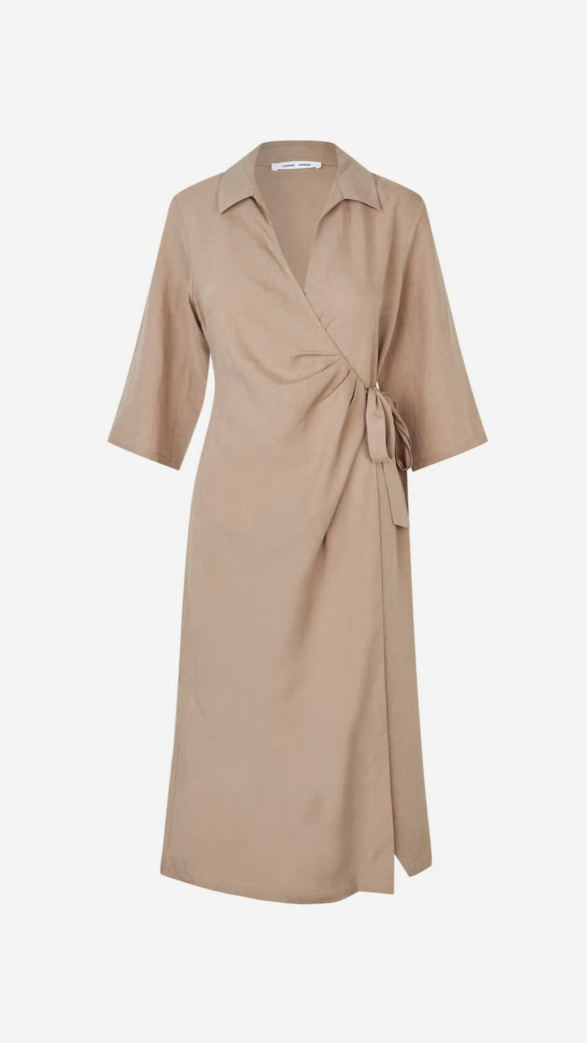 The Sahani Dress - Greige by Samsøe Samsøe offers a regular fit with three-quarter sleeves and a waist tie. This chic, knee-length wrap dress, made from recycled polyester, is elegantly styled against a white background.