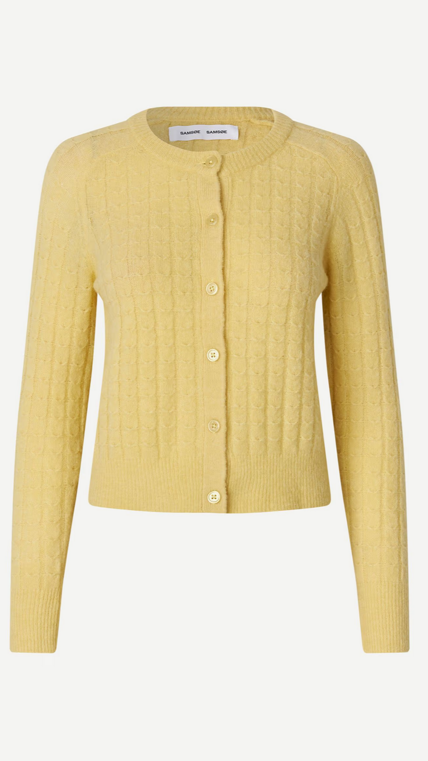 The Sabarbara Cardigan in Dusty Yellow by Samsøe Samsøe is a cozy wool and alpaca blend, featuring a cable-knit design with a round neckline and button-front closure.