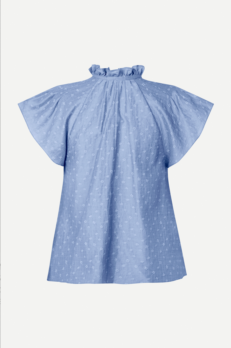 blue short sleeved dressy top back view