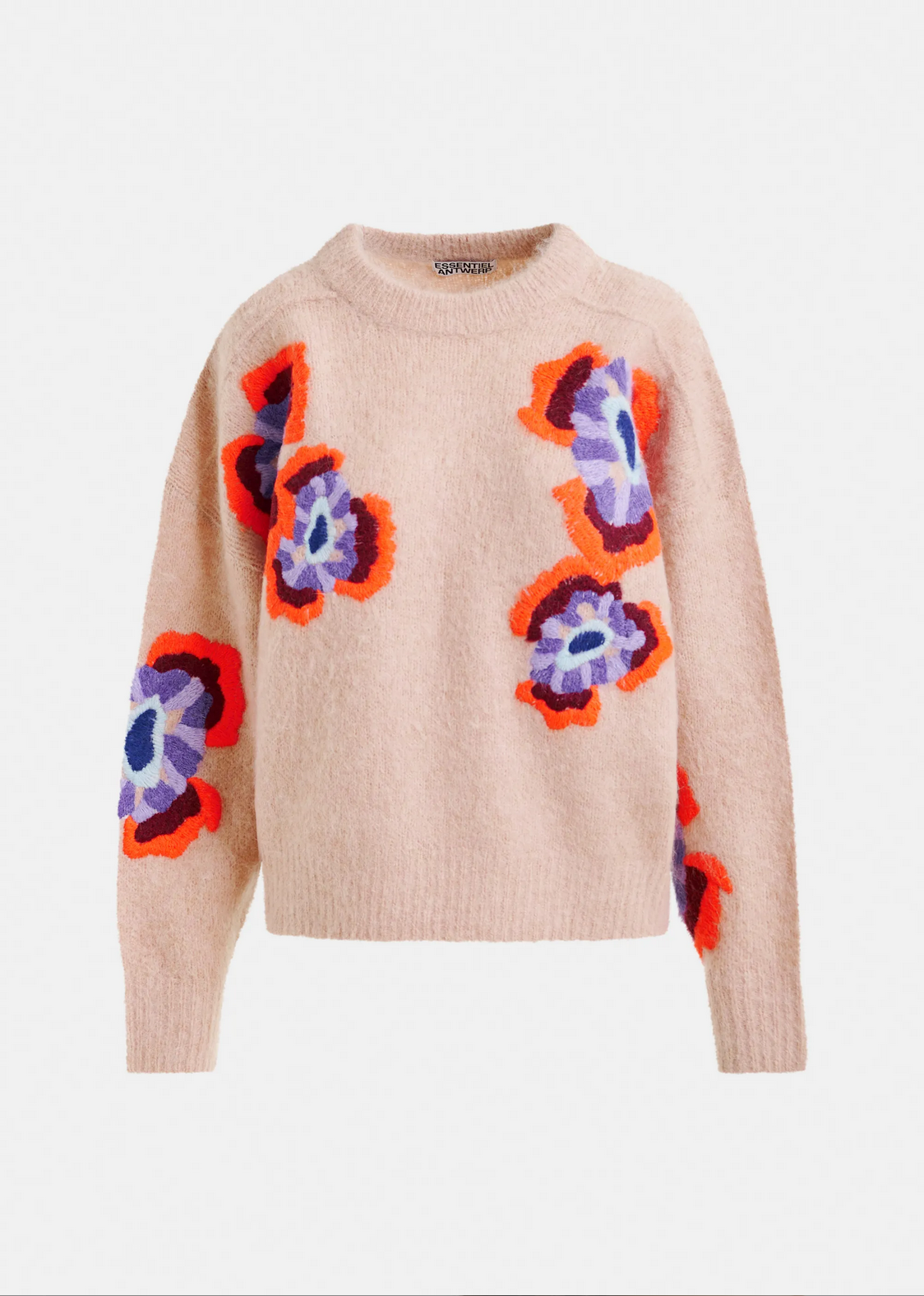 The Impossible Jacquared Knit in beige by Essentiel Antwerp features long sleeves and large abstract floral patterns in red, purple, and blue, crafted from a soft mohair-blend yarn for a vibrant multicolor look.