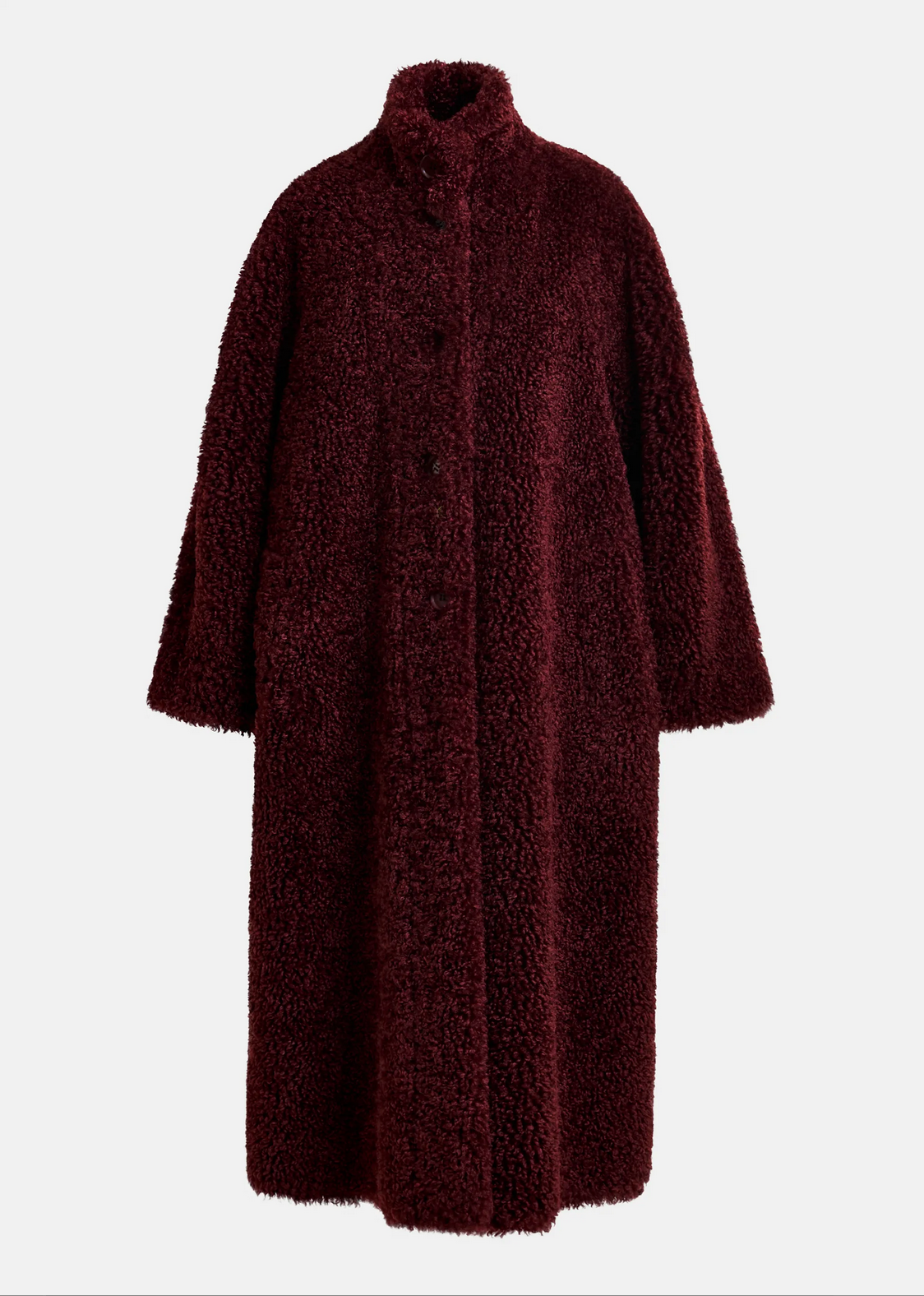 The Essentiel Antwerp Ispot Faux Shearling Coat in burgundy features an oversized fit, high collar, and concealed buttons, shown against a plain white background.