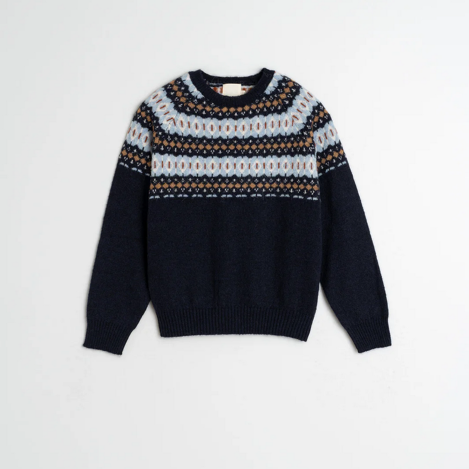 indi and cold Navy blue sweater with patterned yoke on a white background