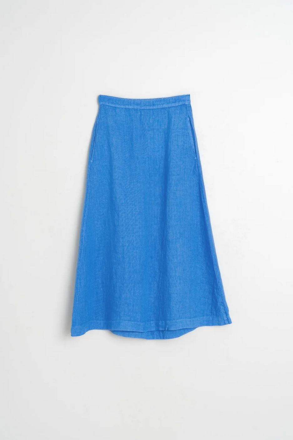 The Indi & Cold Linen A-Line Skirt - Blue features a flowy silhouette and slightly flared hem, shown against a plain white background.