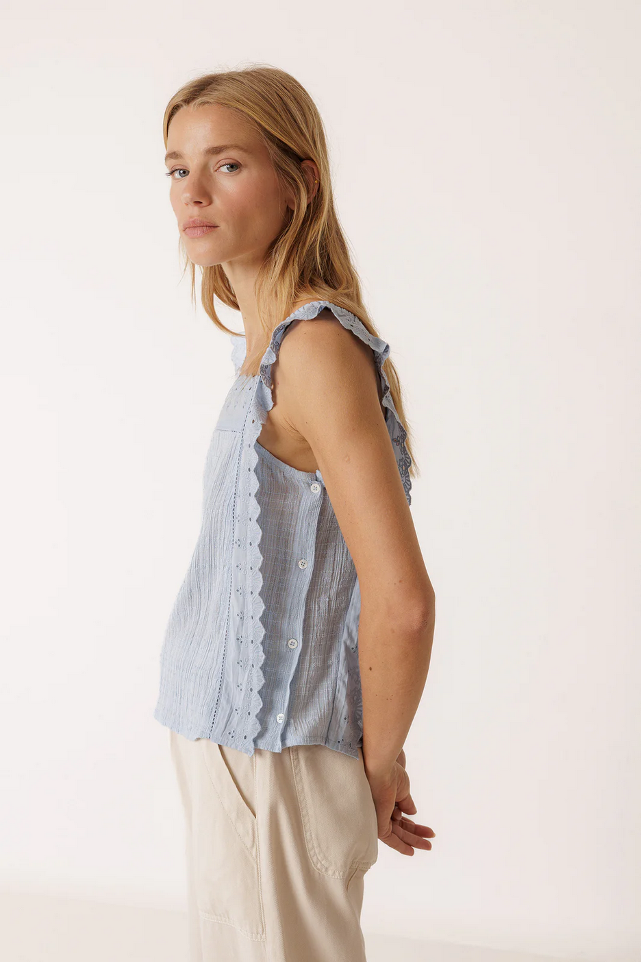 indi and cold Light blue cotton sleeveless top with ruffled straps on a white background