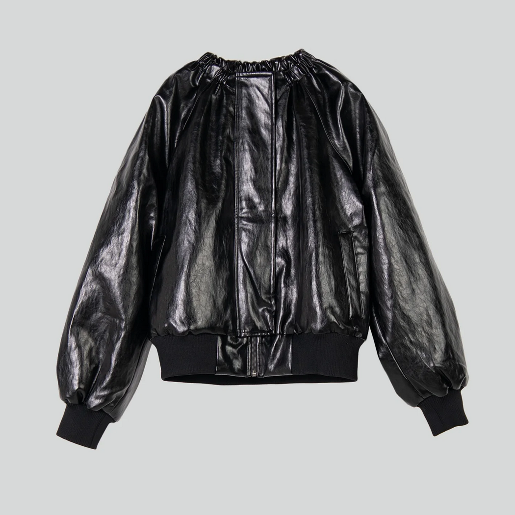 black faux vegan leather jacket on white background