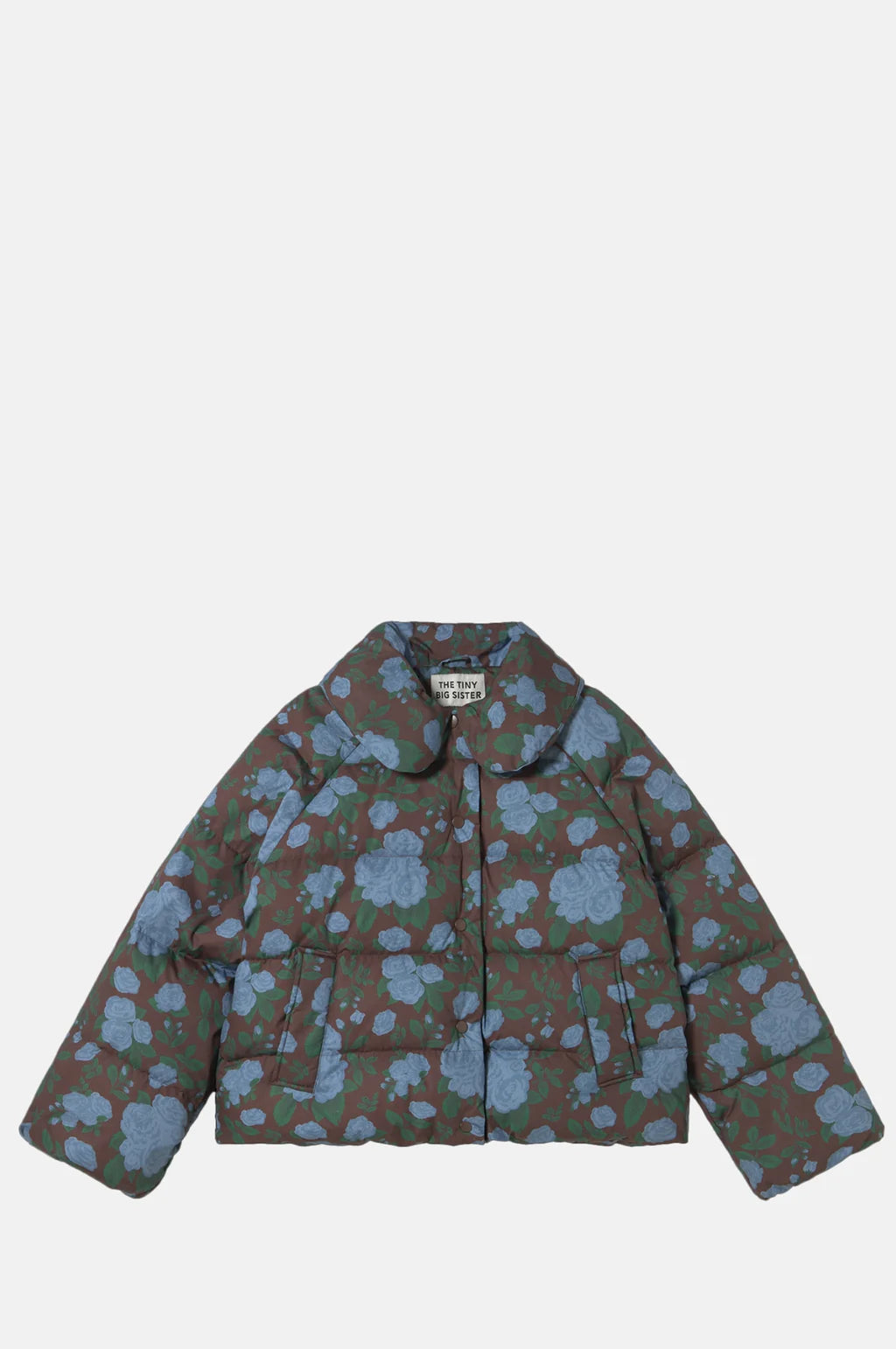 The Roses Short Puffer Jacket - Brown by Tiny Big Sister features a blue rose print, collar, and front pockets, shown against a plain white background.