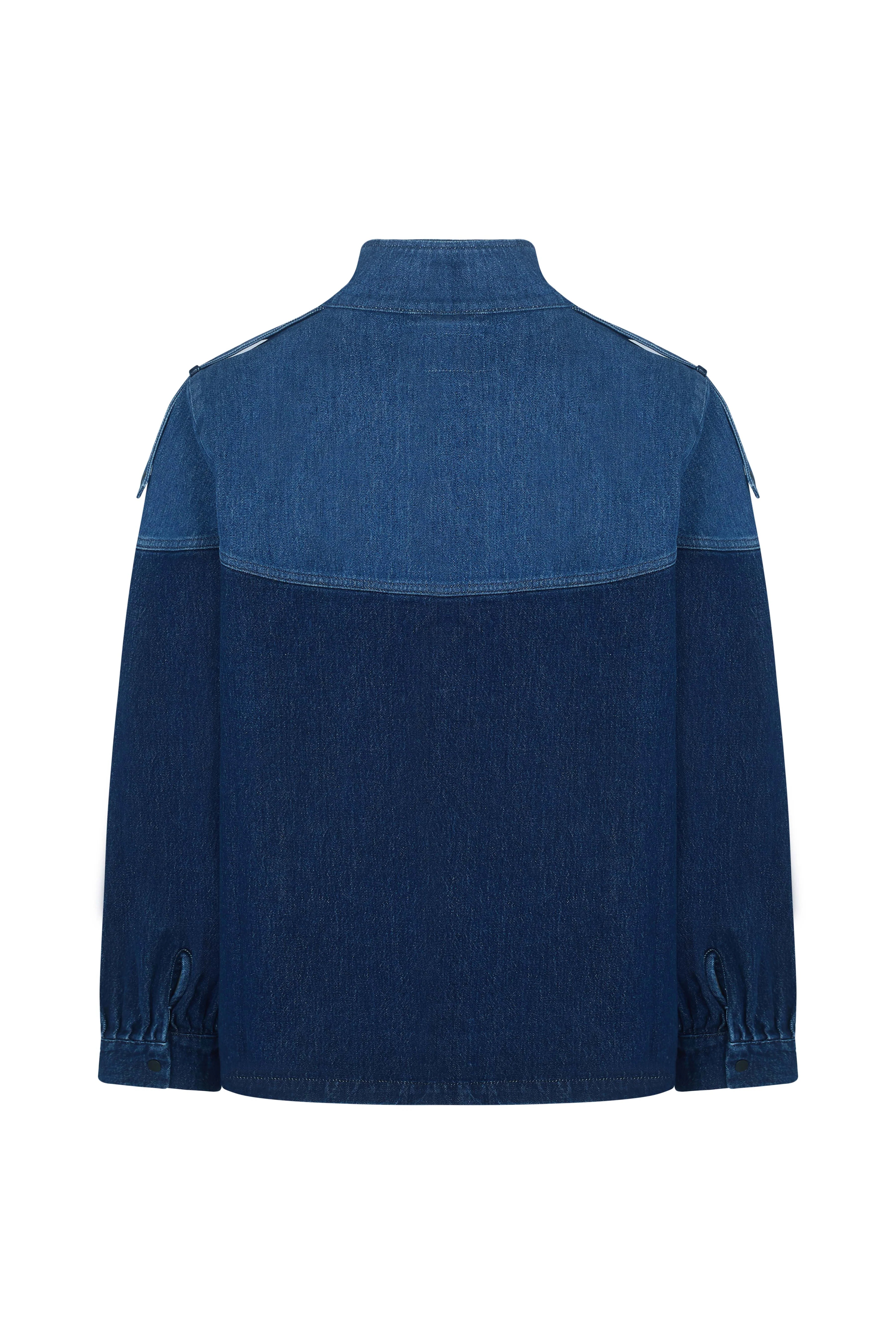 Back view of the Seventy & Mochi Bowie Jacket - Americana, a relaxed fit piece crafted in two-tone denim with a light blue yoke and collar contrasted by darker blue sleeves and lower section, finished with elastic cuffs.