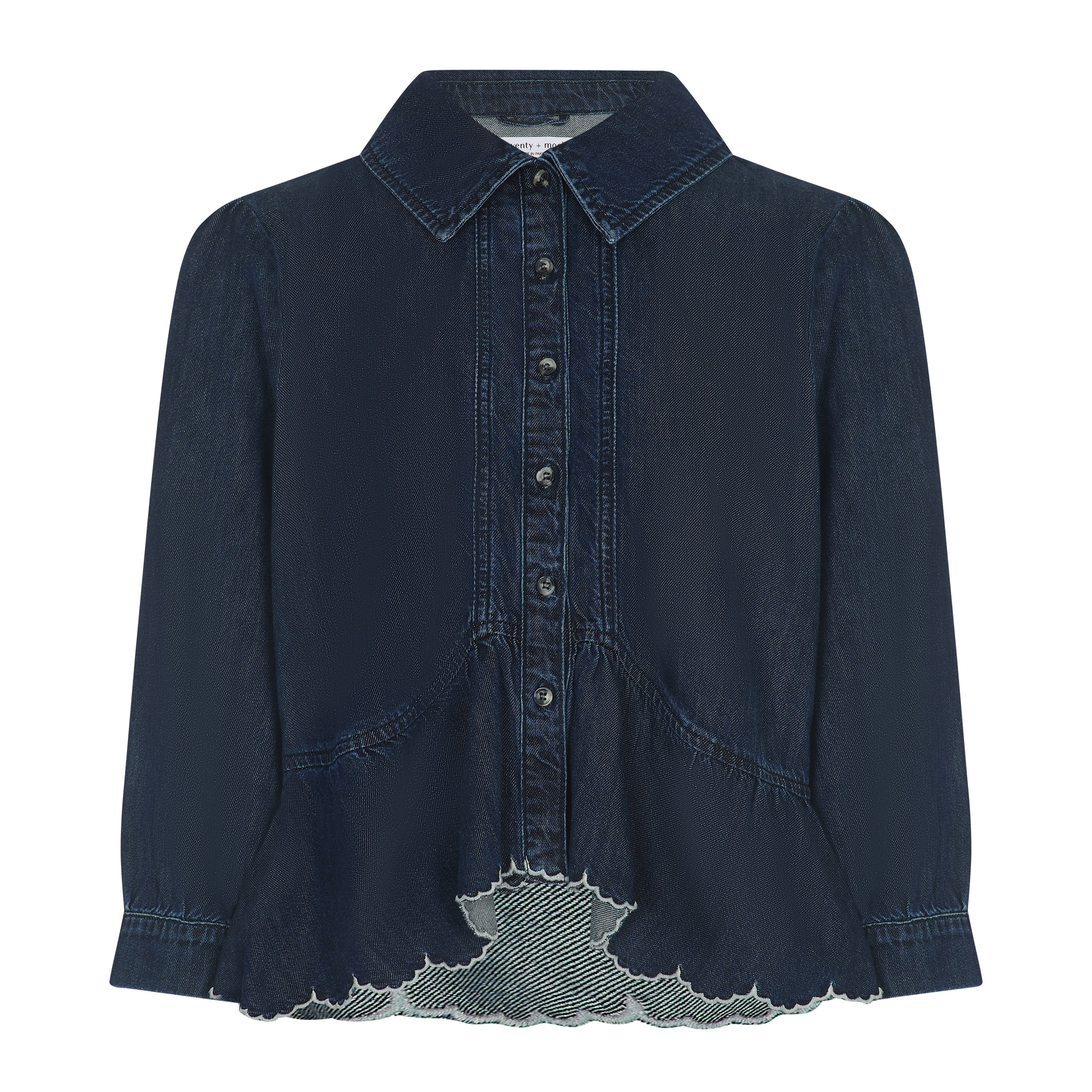 A dark navy blue denim shirt jacket with a pointed collar, button-up front, and a distinctive embroidered hem detail showing a lighter gray lining.