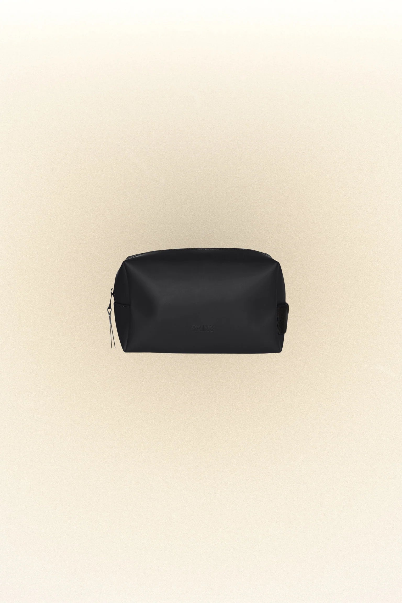 A Rains Wash Bag Small made of waterproof black leather for toiletries.
