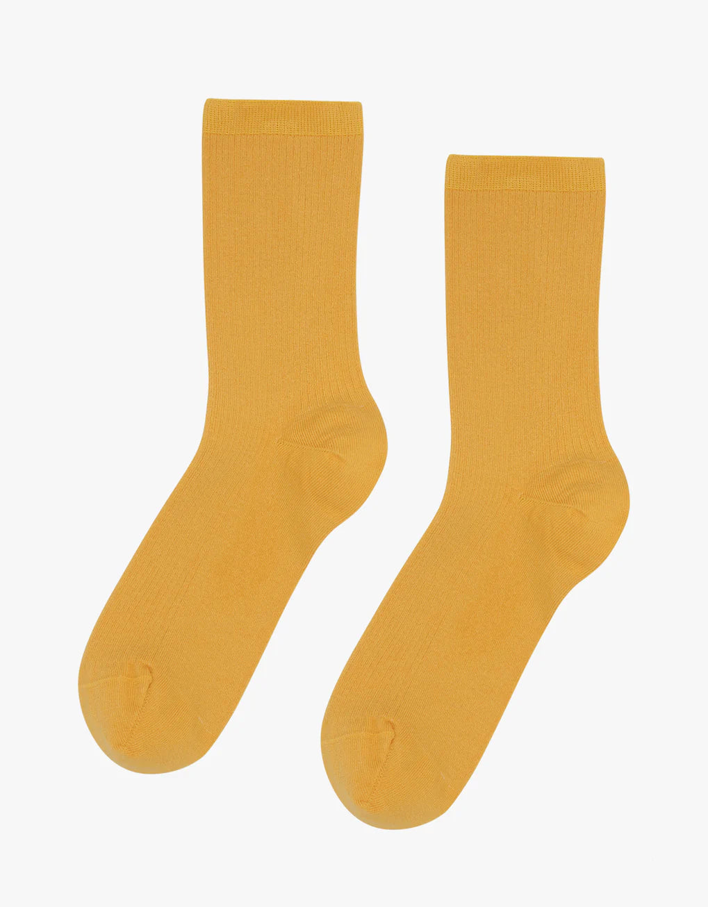 A pair of Colorful Standard Classic Organic Socks on a white background.