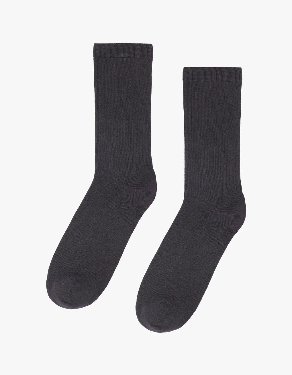 A pair of Colorful Standard Classic Organic Socks made from organic cotton on a white background.