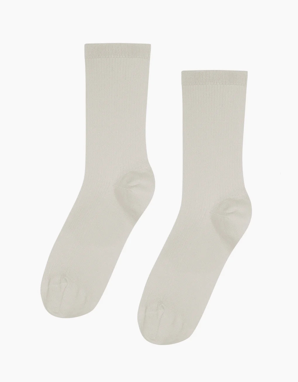 A pair of Colorful Standard Classic Organic Socks made with organic cotton on a white background.