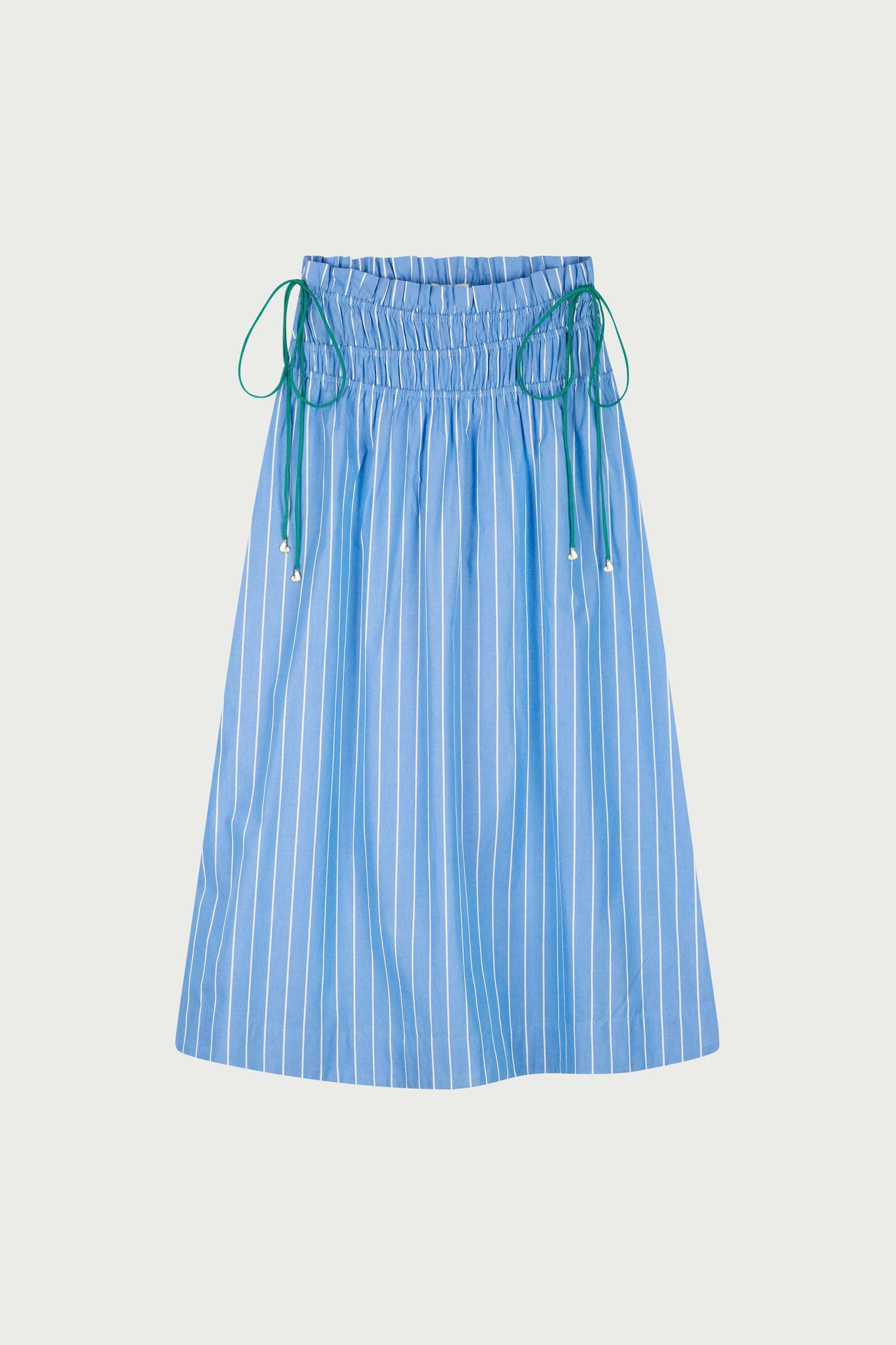 The Yoko Ruched Skirt - Marine Blue by Fabienne Chapot features blue and white stripes, organic cotton, a knee-length cut, elastic waistband, and green side drawstrings—ideal for fans of sustainable fashion.