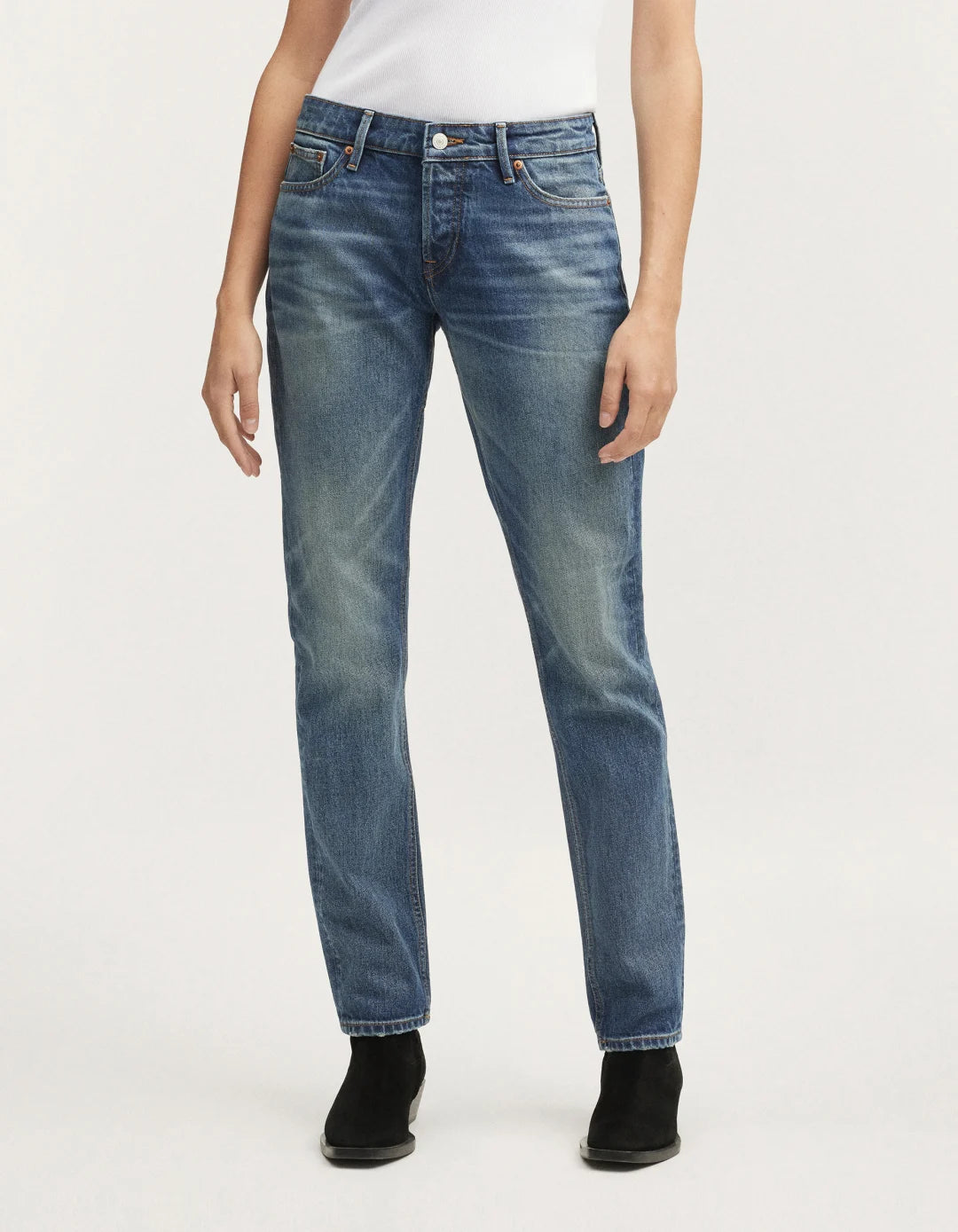 Girlfriend style jeans in a mid blue wash