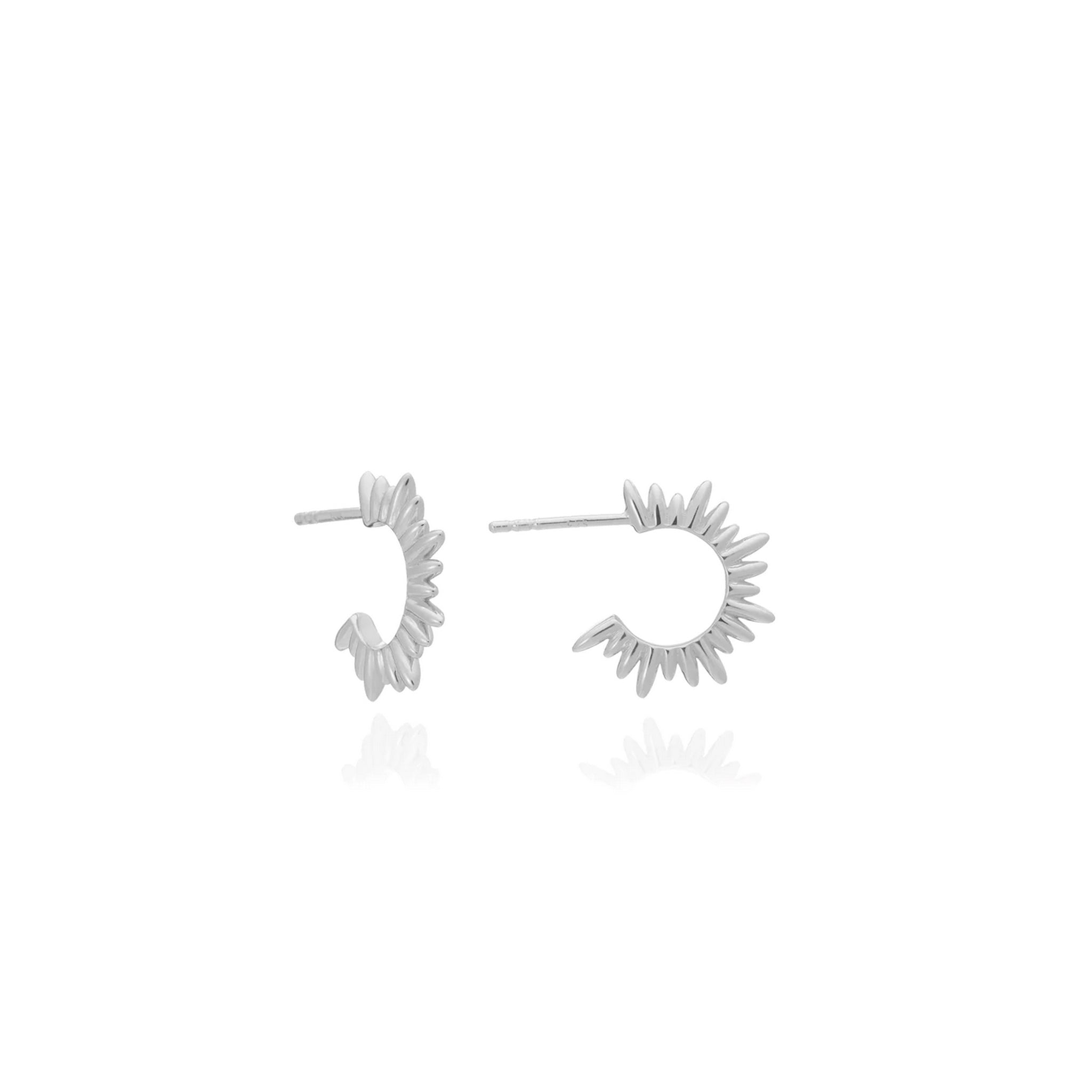 A pair of Electric Goddess Mini Hoop Earrings - Silver from Rachel Jackson with an Art Deco twist on a white background.