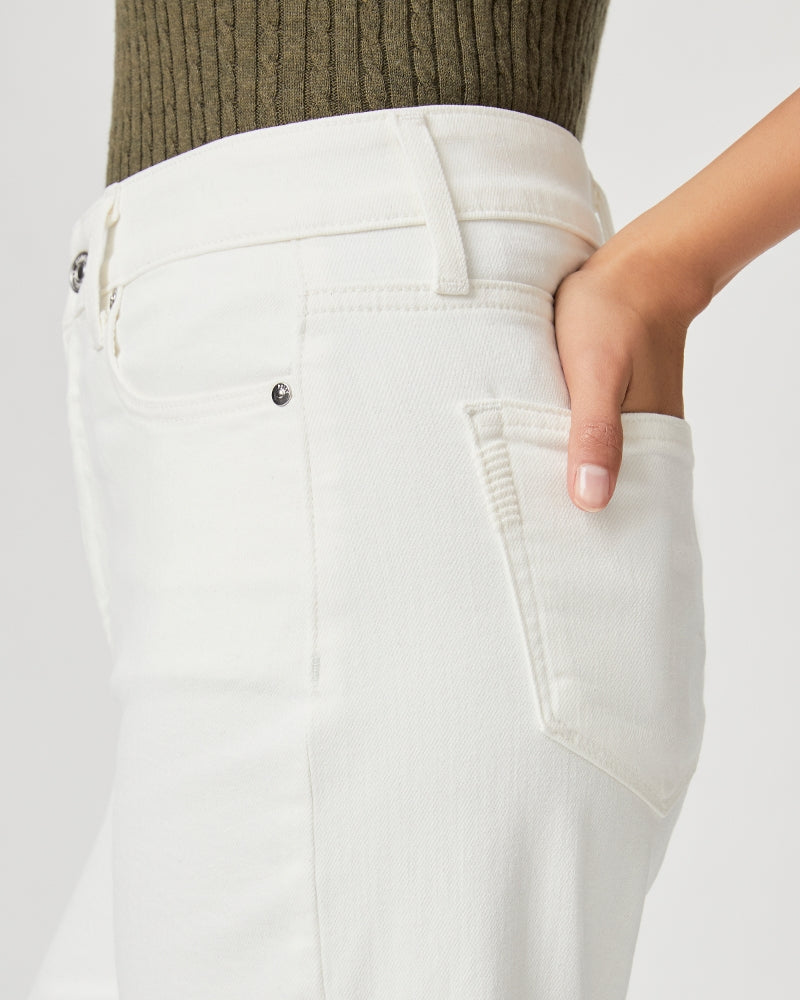 The back pocket of a woman's high-waisted white Paige jeans, the Anessa Wide Leg - Light Ecru.