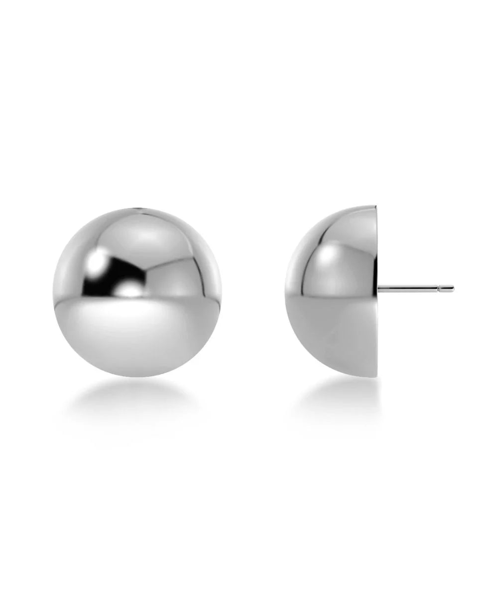 The EDBLAD Bead Studs feature a pair of spherical silver beads with a lightweight design and reflective surfaces that captivate attention.