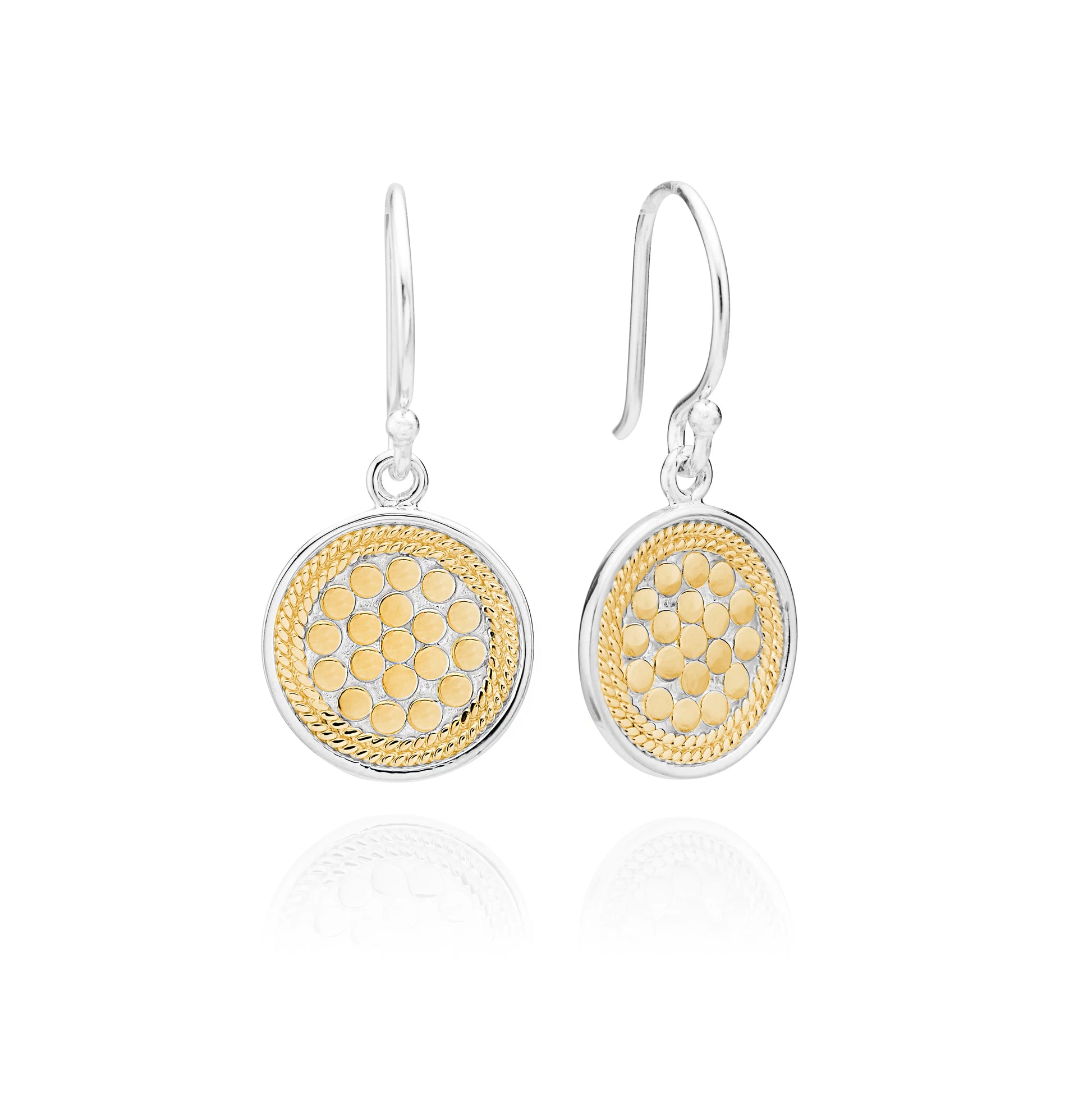 The Circle Drop Earrings - Gold by Anna Beck are a pair of sterling silver and 18k gold-plated dangle earrings with a honeycomb pattern and hook attachments, showcasing an exquisite Balinese dotting technique.