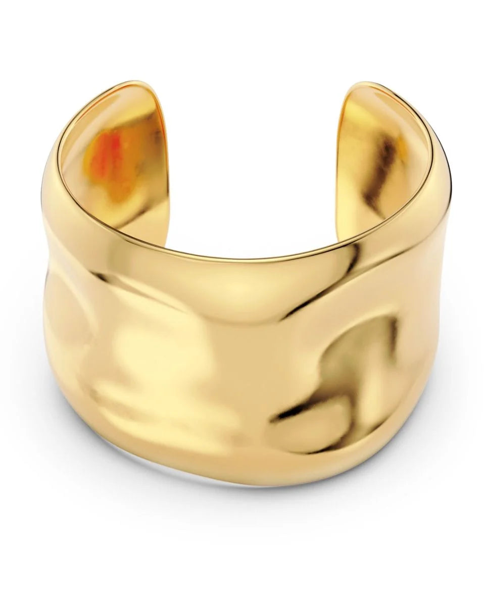 Introducing the Flowy Bangle by EDBLAD: This wide, glossy gold cuff bracelet features luxurious 14K gold plating and a smooth, slightly wavy surface. It's an eye-catching design that's perfect for statement jewelry lovers.