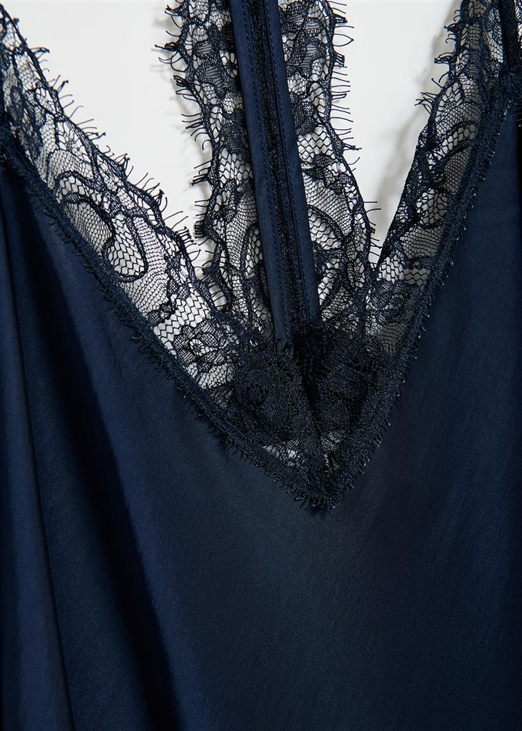 close up of navy slip dress with lace