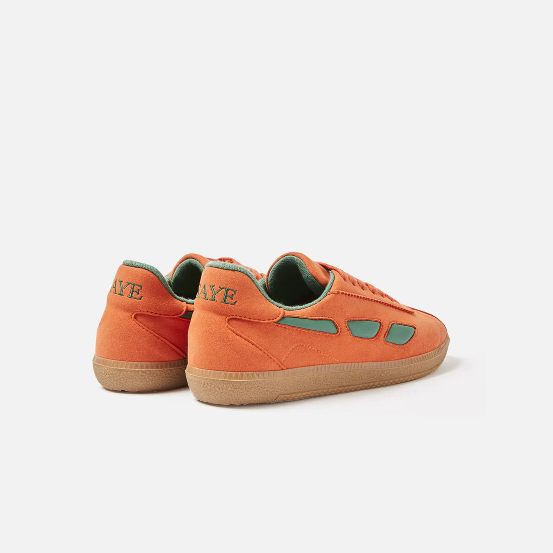 A pair of SAYE Modelo '70 Sneakers - Orange & Green with a retro silhouette.