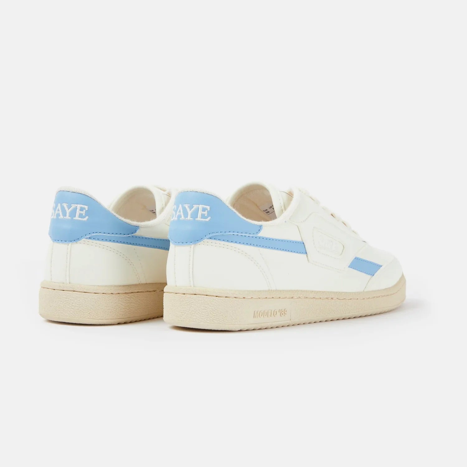Off white sneakers with light blue side detail