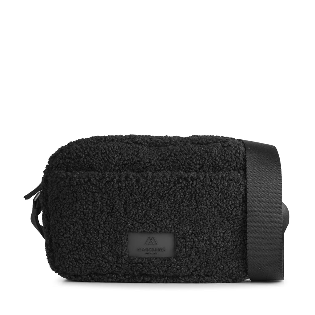 A sustainable vegan Alexis MBG Crossbody Bag - Black made from recycled plastic with a strap, by Markberg.
