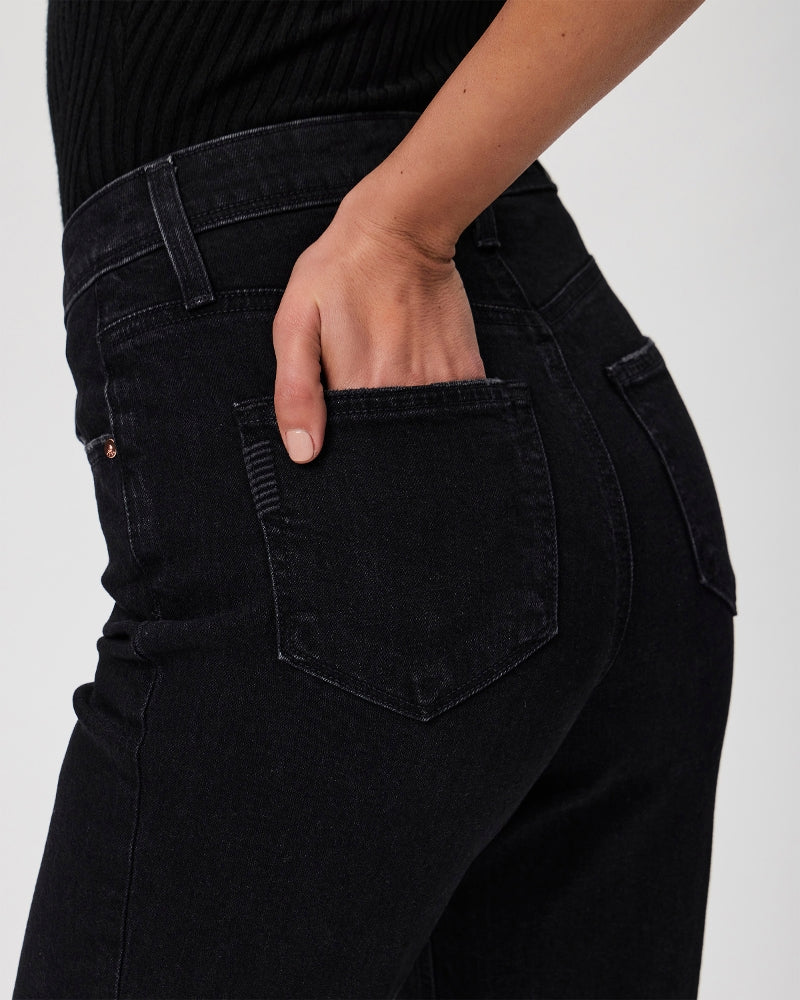 model wearing black straight leg paige jeans