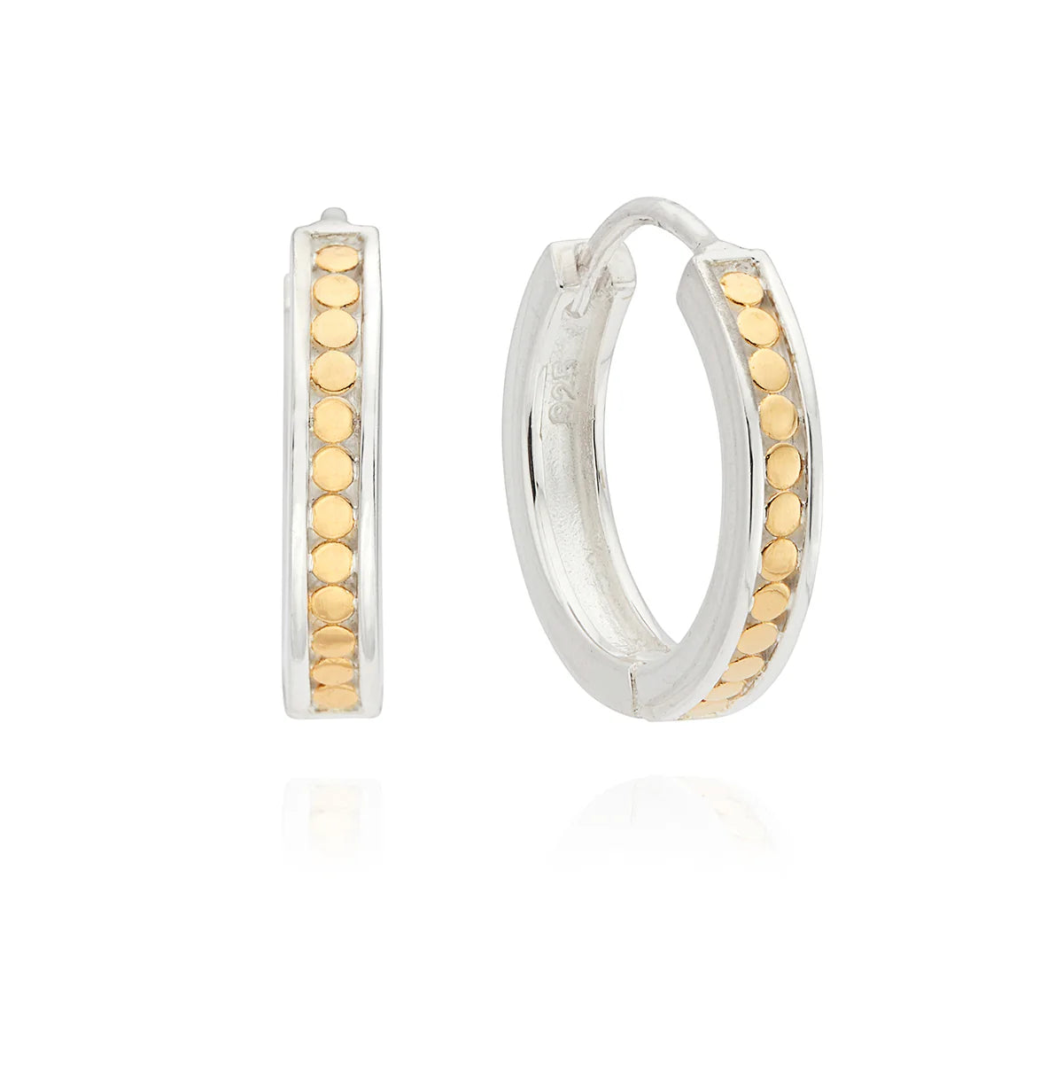 The Classic Small Hoop Earrings by Anna Beck showcase a sterling silver base with 18k gold plating and a row of dainty gold-colored dots along the outer edge.