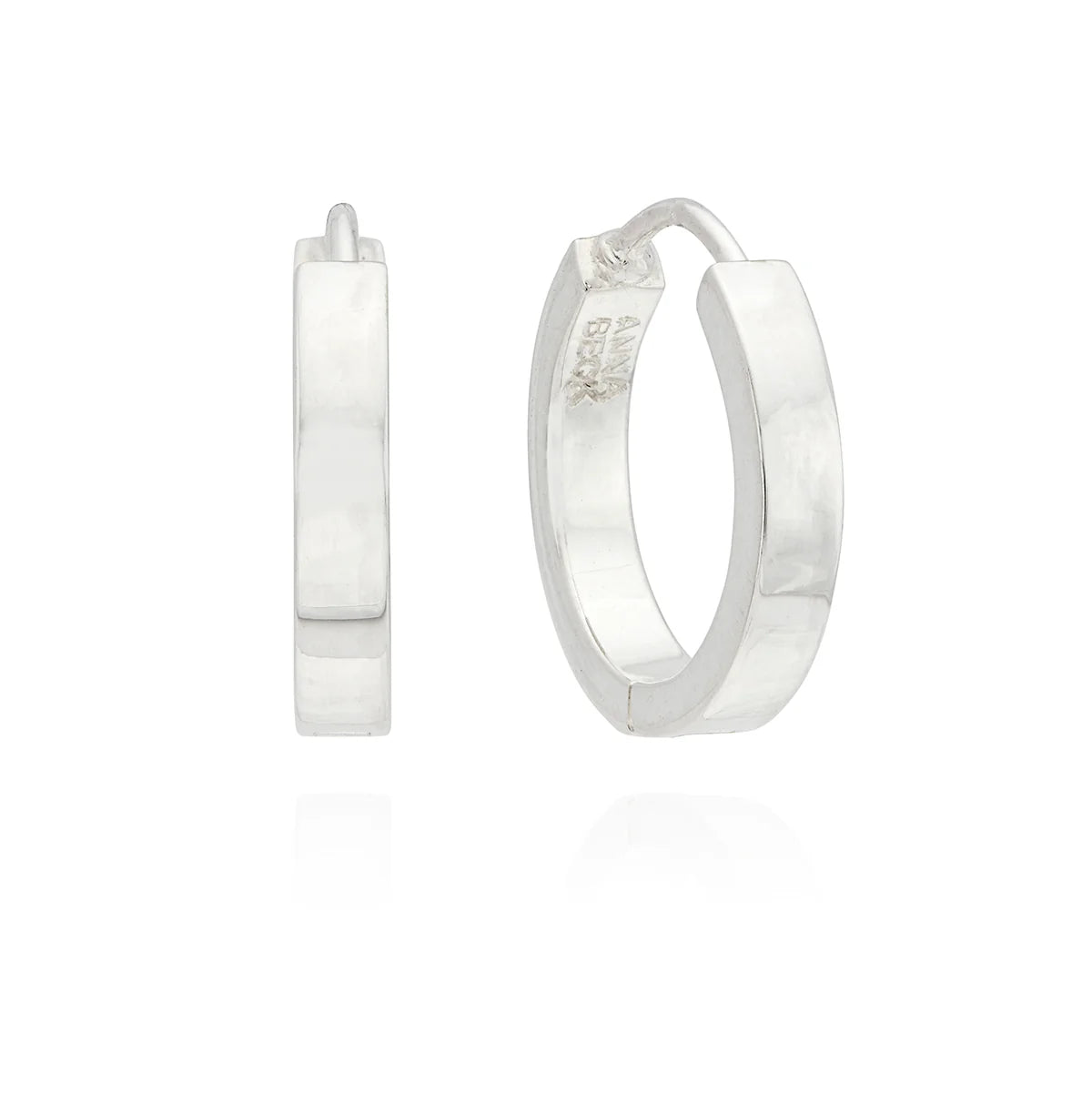 Introducing the Classic Small Hoop Earrings by Anna Beck, a pair of classic hinge hoops beautifully crafted in sterling silver, shown from both front and side views.