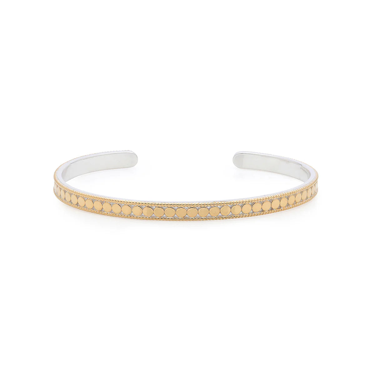 Introducing the Classic Stacking Cuff - Gold by Anna Beck: a silver cuff bracelet adorned with a striking 18k gold-plated dotted pattern along the center, meticulously crafted using traditional Balinese techniques.